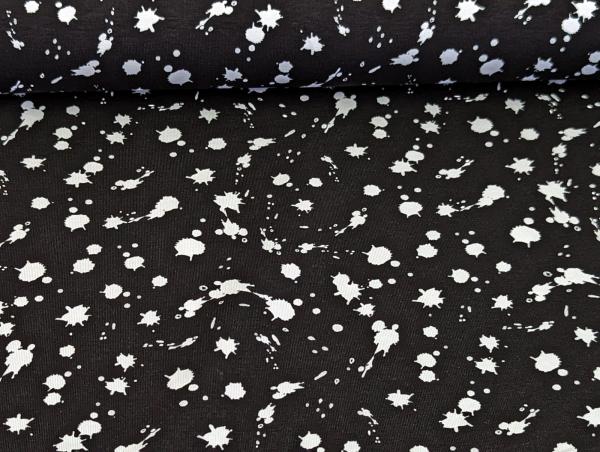 Baumwolljersey Weiße Farbkleckse auf Schwarz 35 x 150 cm